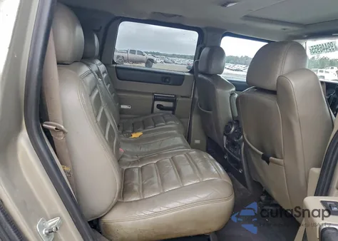 2003 Hummer H2 z USA, uszkodzony, nr VIN 5GRGN23UX3H148591